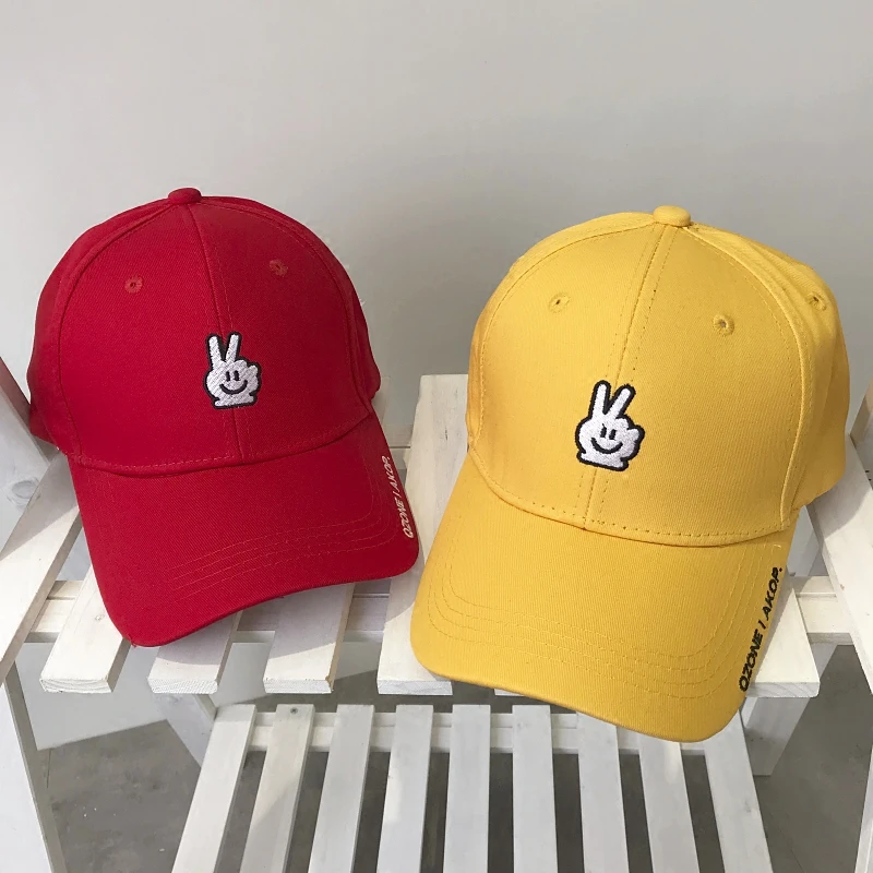 Womens yellow baseball cap with fluke lettering