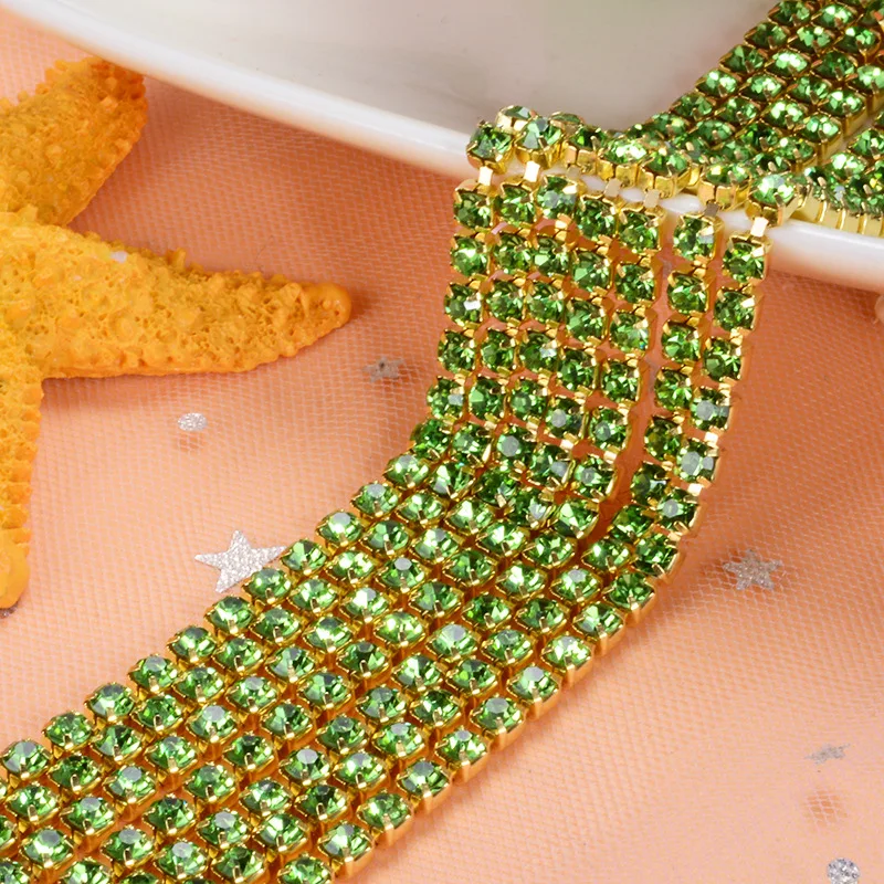 

5yard/piece Light green Glass Crystal sew on rhinestones Chain gold bottom Diy Clothing accessories SIJISHUIZUAN