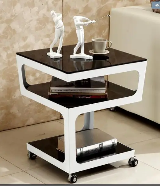 Simple modern sofa corner. Metal tempered glass multi-layer white edge table. Small tea table..