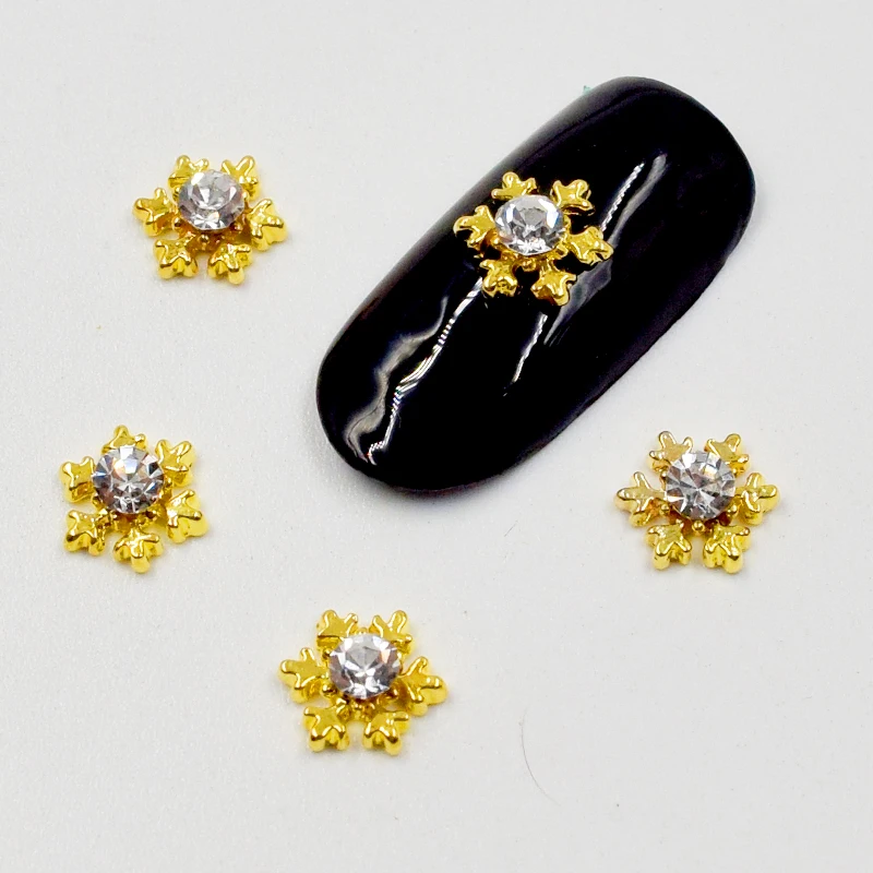 

BELESHINY10pcs / pack Gold Silver 3D Snowflake Design Nail Decorative Alloy Rhinestone Nail Art DIY Manicure Accessories SS578