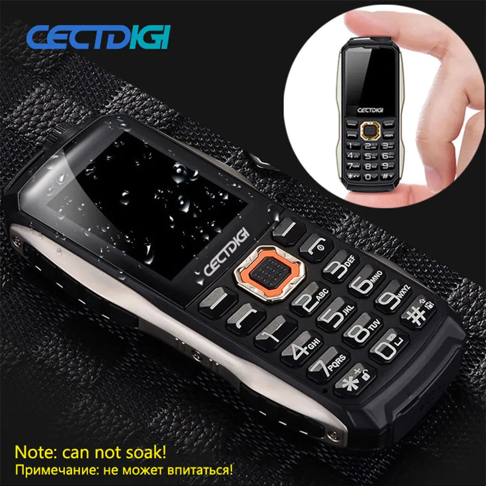 Жесткий компактный телефон с двумя фонариками 2 Sim карты FM радио Bluetooth