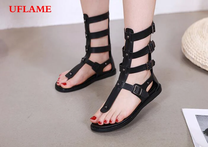 

Fashion Women Roman Toe-clipping shoes Soft bottom high quality Leather sandals Simple Metal rivet Buckle Women Flat sandals