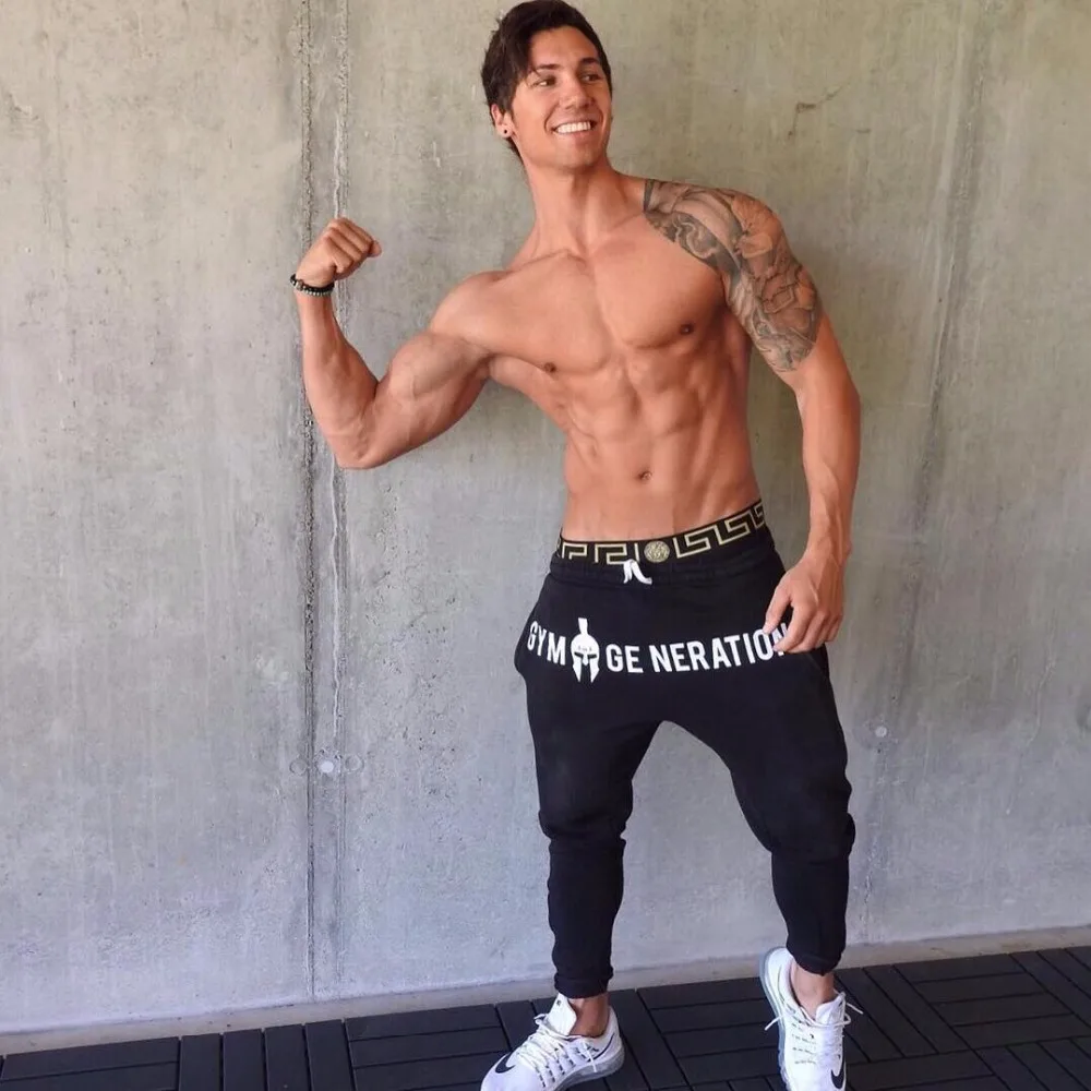 Cena Marka siłownie mężczyźni biegacze Casual męskie spodnie dresowe biegaczy spodnie Pantalon Homme odzież sportowa spodnie kulturystyczne
