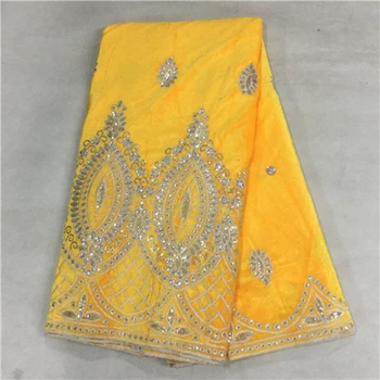 

New Yellow color factory cheap price thick African velvet lace fabric material with sliver color sequins flannelette clothing