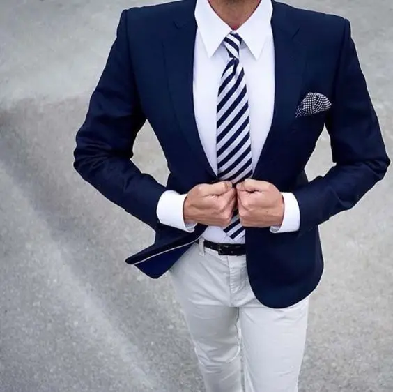 white blazer blue pants