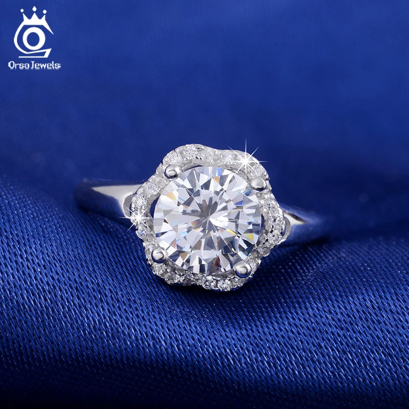ORSA JEWELS Fashion Jewelry Flower Wedding Ring for Women Engagement Rings with One Big Luxury 2 Carat AAA Cubic Zirconia OR34