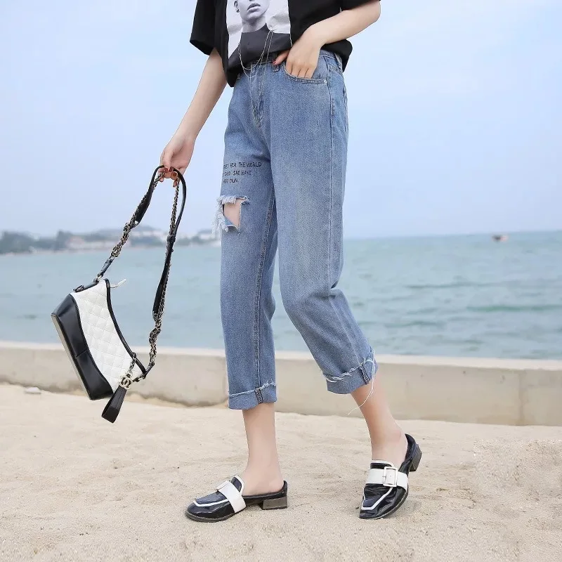 MingJieBiHuo Fashion women Korean new arrival Casual loose jeans ripped