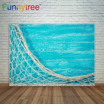 

Funnytree Fishing net on old blue board background with copy space decoration photographic background a photo