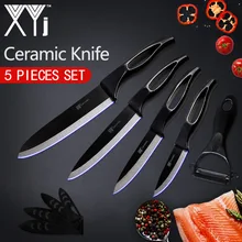 XYj Kitchen Ceramic Knife Cooking Set 3, 4, 5, 6 inch + Peeler White And Black Blade Hollow Handle Cooking Knife Kitchen Tools