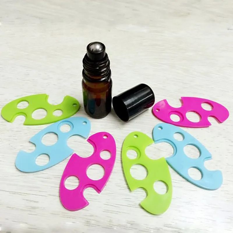 

10PCS Triangle Leaf Shape Essential Oil Bottles Opener Key Corkscrew Tool Remover Roller Balls Caps Refillable Bottles