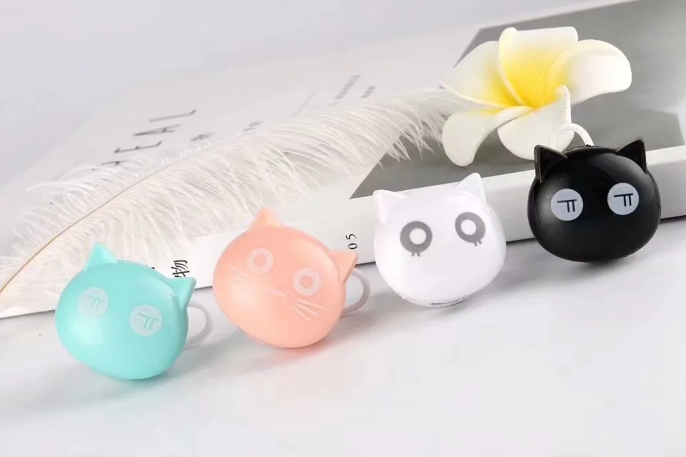 Cat head Insert card cartoon cute style MP3 new screenless sports mini cartoon mp3 player.