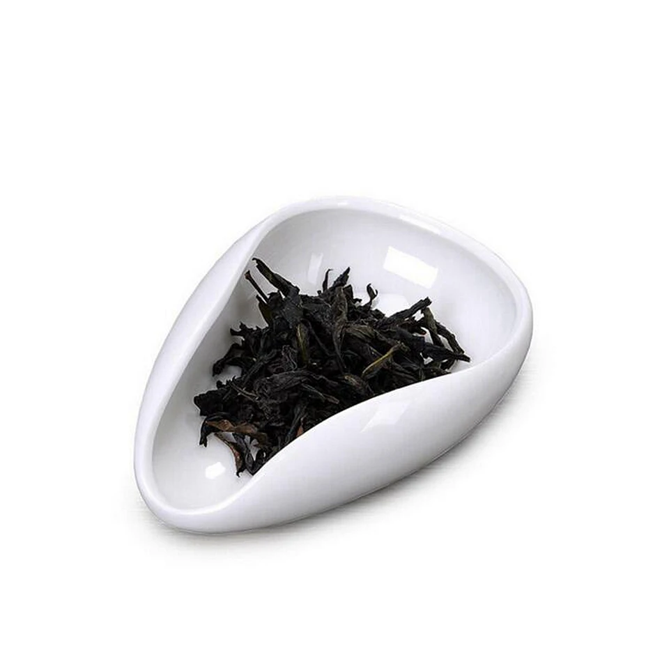 

Beautiful Chinese dehua white ceramic Tea Scoop lotus leaf shape Beautiful Traditional Tea Set Scoops