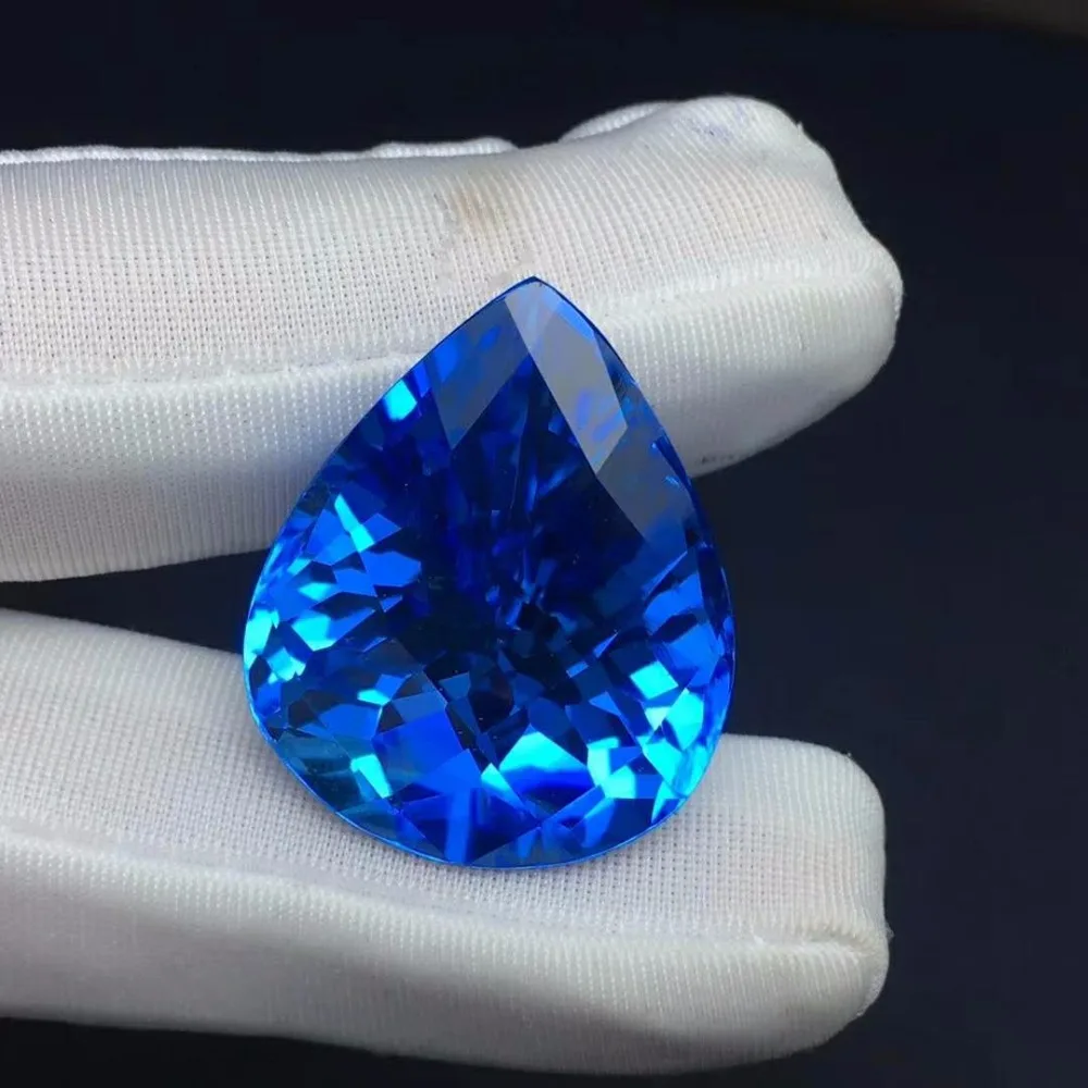 

Natural Swiss Blue Topaz,Weight: 64.2ct Specifications: 28.9 x 23 x 14.5mm,Perfect gemstone perfect quality
