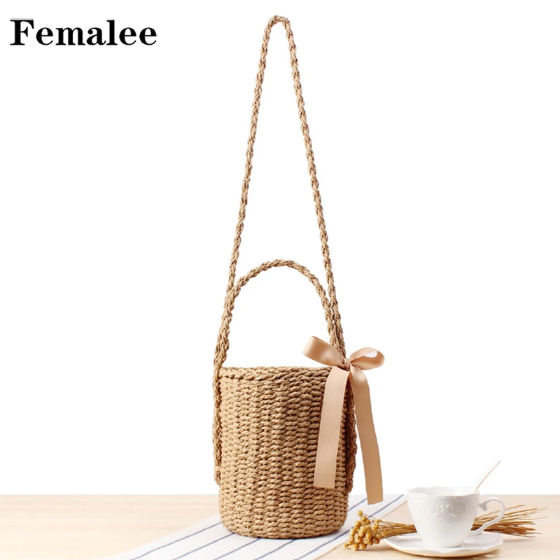 FEMALEE الريفية الصيف أشرطة القوس القش حمل النساء الشارع الصور دلو الأعلى مقبض حقيبة أسطواني المنسوجة ورقة حبل الكتف أكياس FEMALEE الريفية الصيف أشرطة القوس القش حمل النساء الشارع الصور دلو الأعلى مقبض حقيبة أسطواني المنسوجة ورقة حبل الكتف أكياس