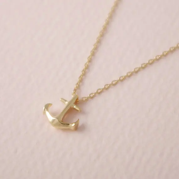 Tiny Anchor Necklace In Gold.jpg