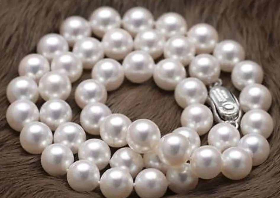 

FREE SHIPPING HOT sell new Style >>>>> natural 9-10mm AAA+ south sea white Round pearl necklace 17