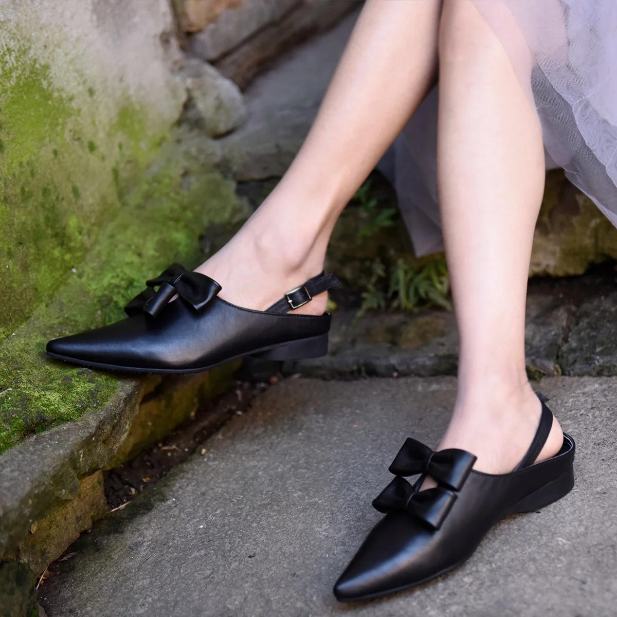 womens black bow sliders