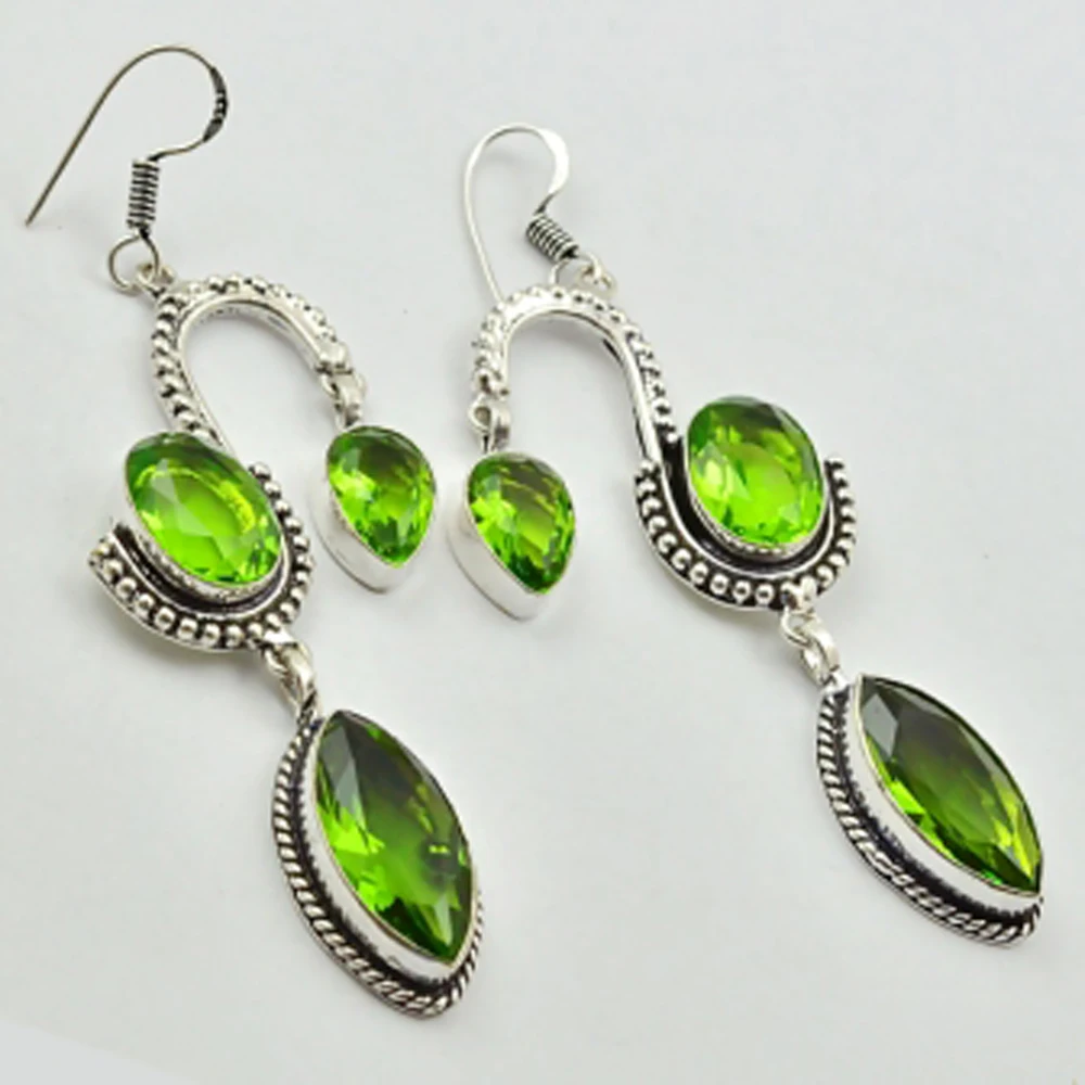 

Peridots , Silver Overlay on Copper Earrings, 75 mm , E2743