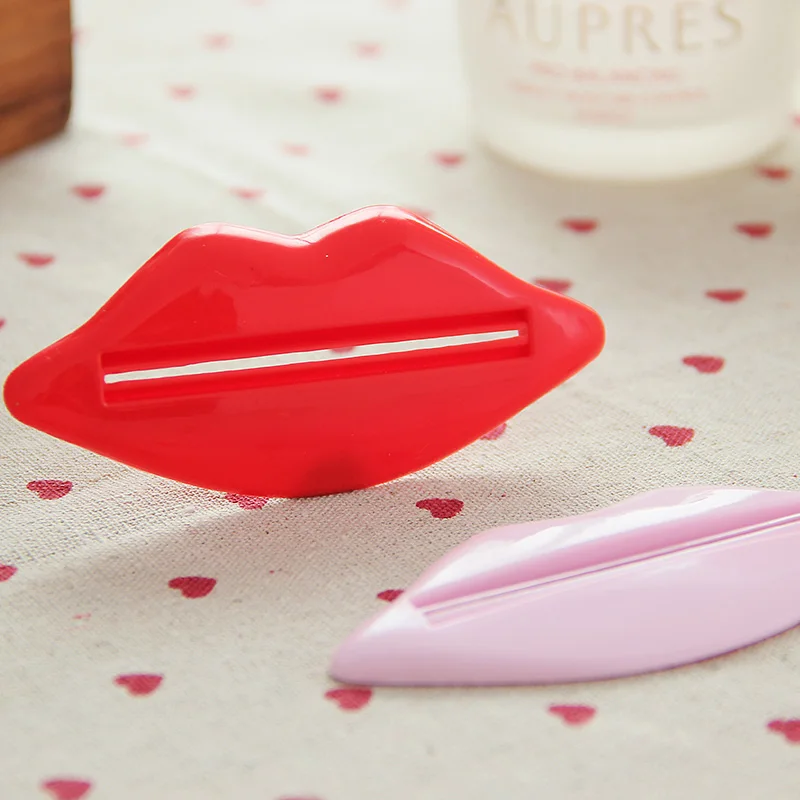 

2Pcs Top Sale Sexy Hot Lip Kiss Bathroom Tube Dispenser Toothpaste Cream Squeezer Home Tube Rolling Holder Squeezer