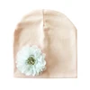 pink hat white flowe
