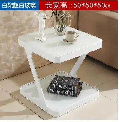 Simple modern tempered glass coffee table. Creative living room small side coffee table. Simple modern tempered glass coffee table. Creative living room small side coffee table.