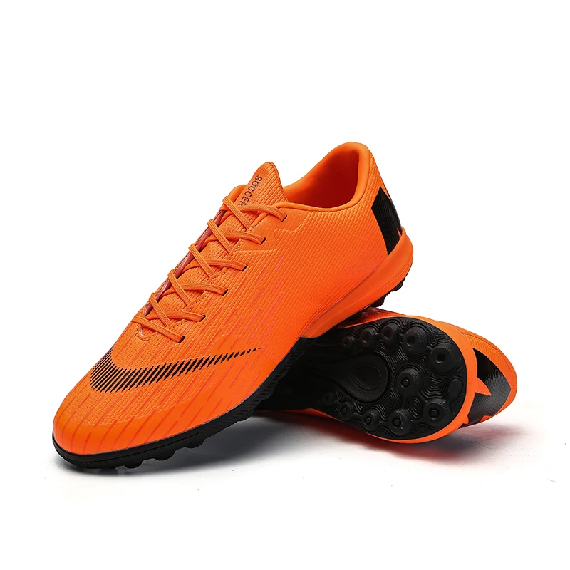soccer cleats on turf