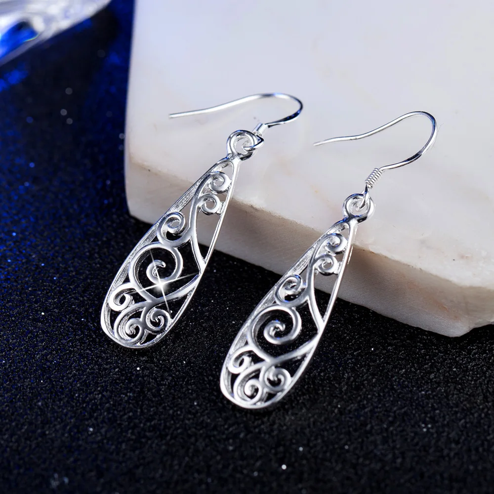 

Hot Sale Silver color Cute Hollow Round Stud Earrings for Women Fashion Vintage Tiny Geometry Jewelry