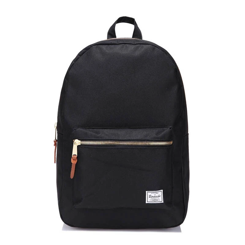 black backpack with gold zippers
