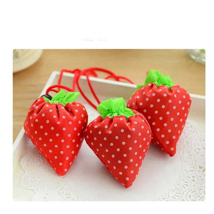 

free shipping 1PCS Random Color Cute Strawberry bag folding shopping bag Creative environmental polyester strawberry bag