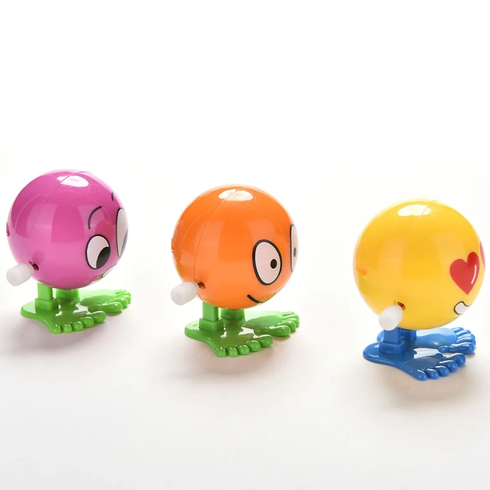 Горячие весенние детские игрушки дружественные экологические материалы красочные смешные лица Somersault Запуск заводная игрушка