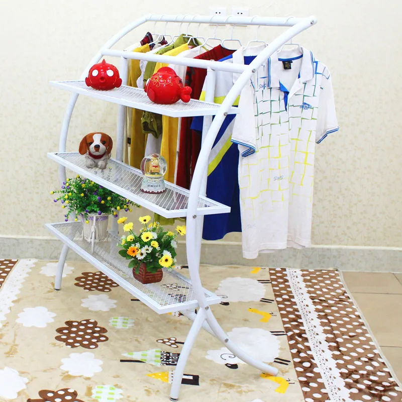 Clothing exhibition shelf. Console clothing display frame. Hanger in Storage Holders & Racks