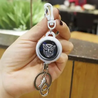 

1pcs Fashion Cool Transformers Retractable Badge Reel Pull ID Card Badge Holder Anti-Lost KeyChain Holder With Wirerope