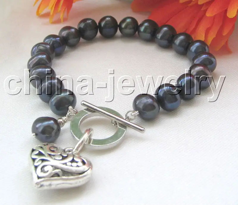 

Free Shipping >>>>>8" 9-10mm black round freshwater pearl bracelet-GP clasp