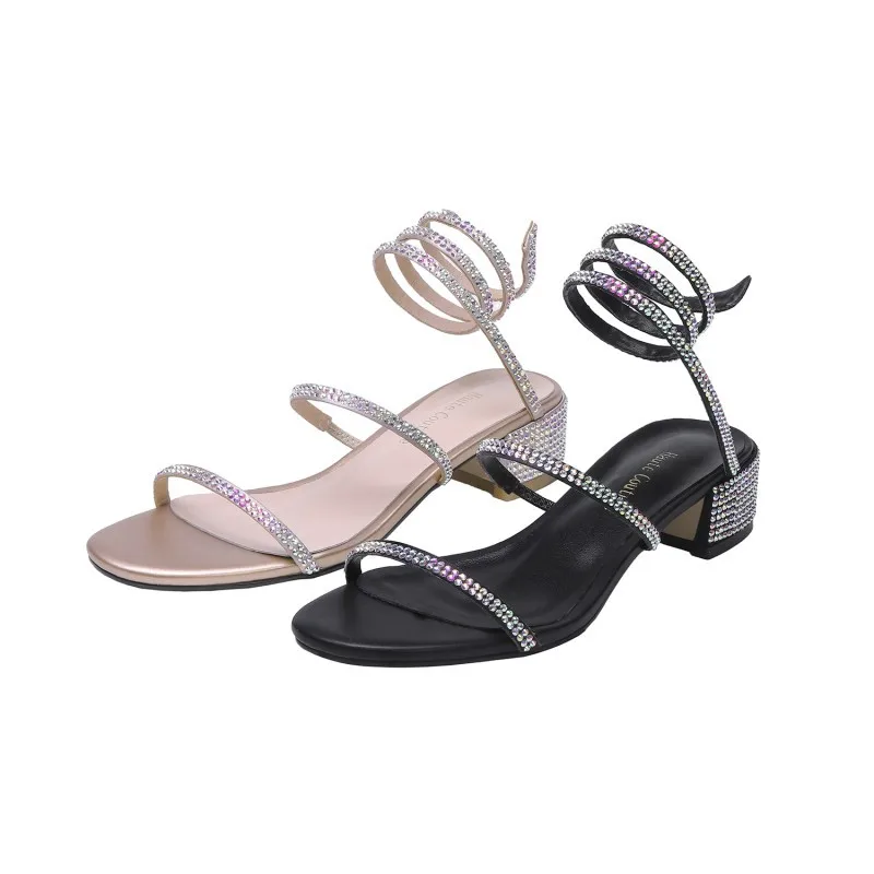

The new 2019 web celebrity is the same hot-selling summer sandal with a snakelike twist and rhinestone chunky midheel for women