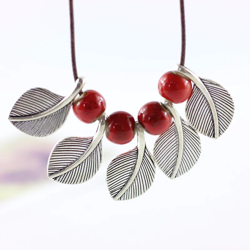 

Wholesale Leaves Necklace Female Clothes Hang Ceramic Pendant Long Sweater Chain Deserve To Act The Joke Fashion Jewelry