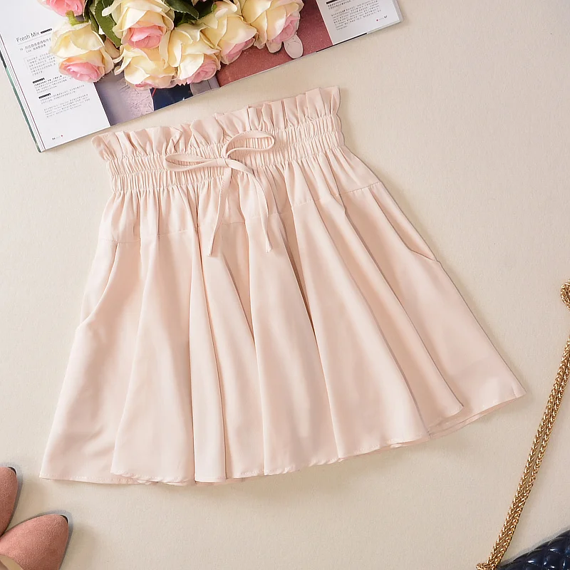 Плиссированные короткие юбки с пикантным бантиком, очень эластичный однотонный девушка мода мини-юбки студент Танцы элегантные юбки