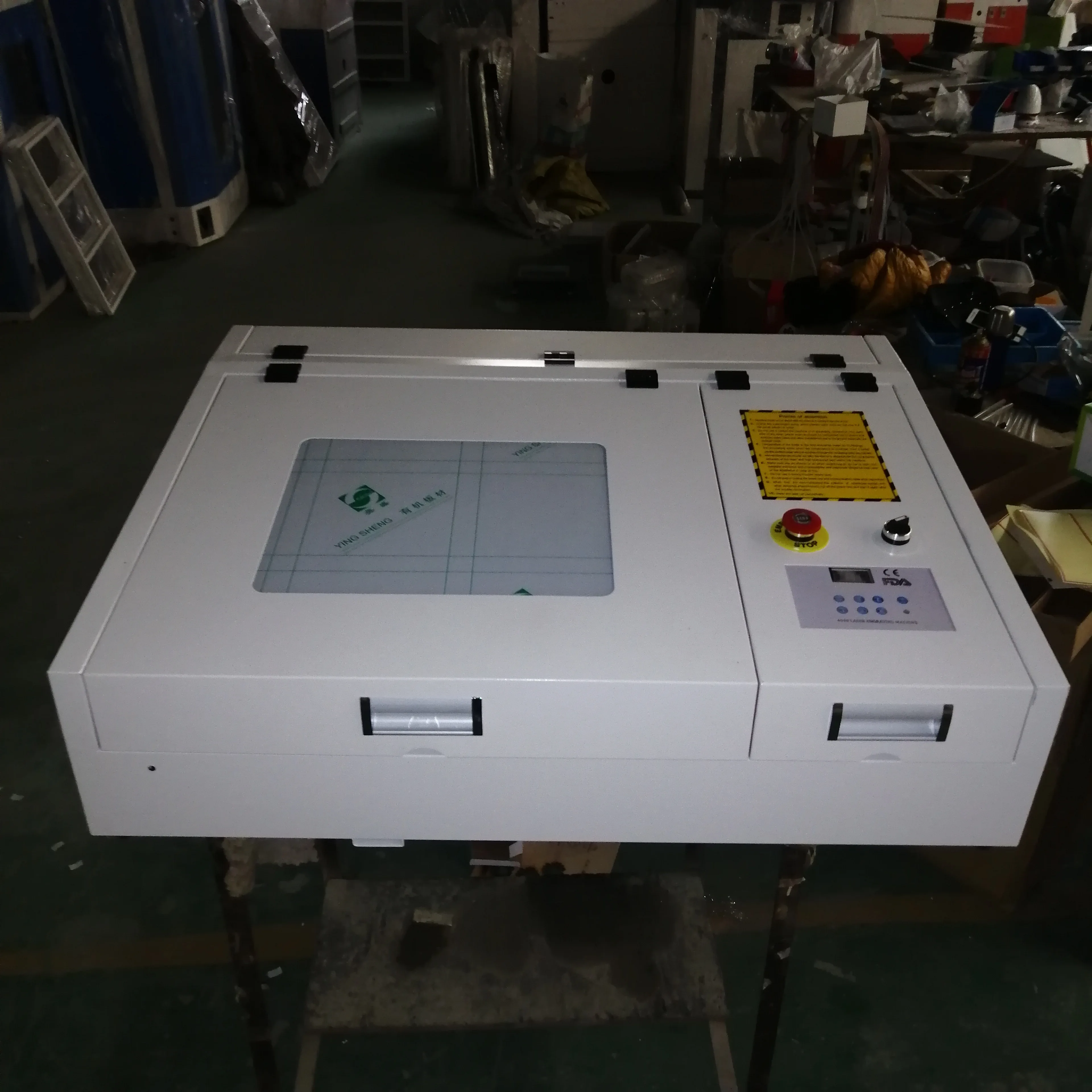 

50W, 4040 laser cutter and engraving machine with white machine shell with gold laser head