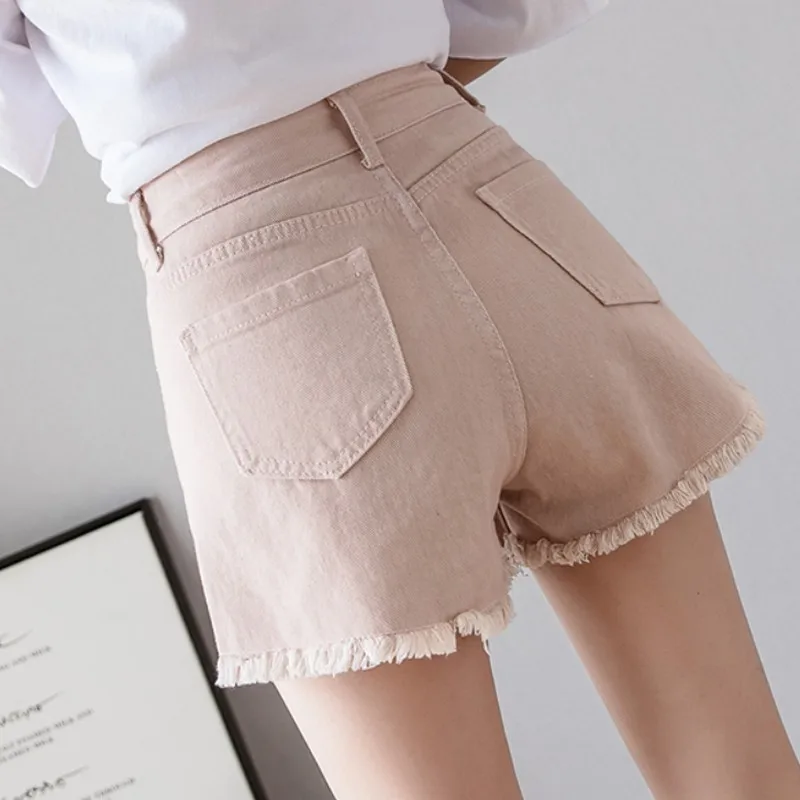 New Korean Style Plus Size Summer Tassel Women Denim Shorts Female Students Metal Ring Decoration High Waist Hole Short Pants New Korean Style Plus Size Summer Tassel Women Denim Shorts Female Students Metal Ring Decoration High Waist Hole Short Pants