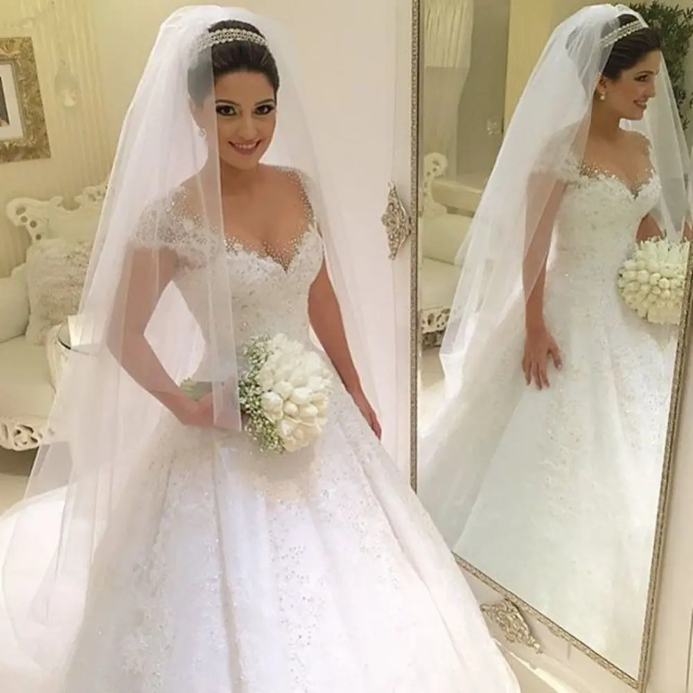 

Sexy Sheer Neck Lace Ball Gowns Wedding Dresses 2019 for Women Princess Cap Sleeves Zipper Bridal Gowns with Petticoat and Veils