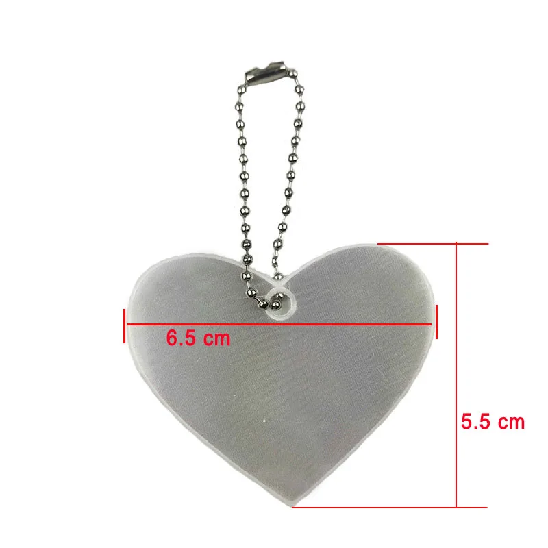 Светоотражающий брелок Meilite 250 candle lights из мягкого ПВХ с отражателем сердца