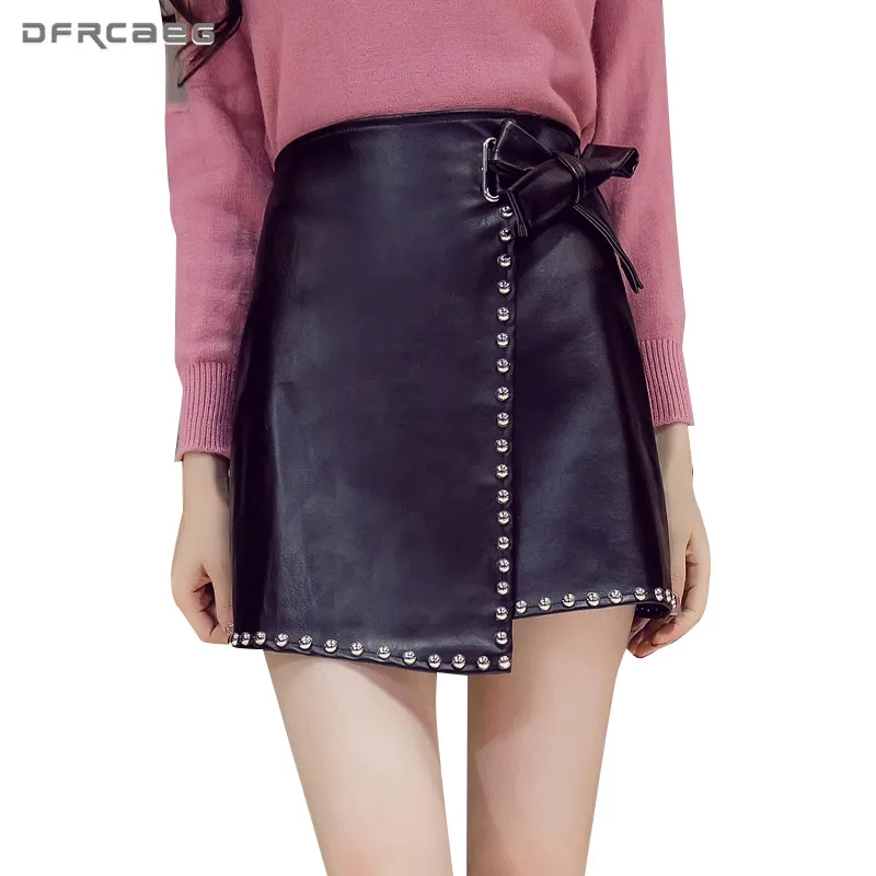 Online Falda corta de cuero de imitación de mujer negra remache 2019 Otoño Invierno moda Vintage alta cintura Casual PU A Line falda con lazo femenino