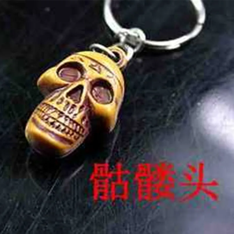 

new fashionable creative tower wood imitation retro skeleton super affordable key ring wholesale