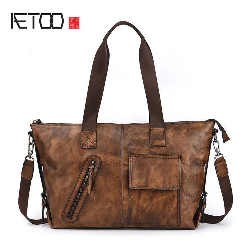 

AETOO Leather men's handbag, casual crossbody bag, retro personality head cowhide men's singles shoulder Bag