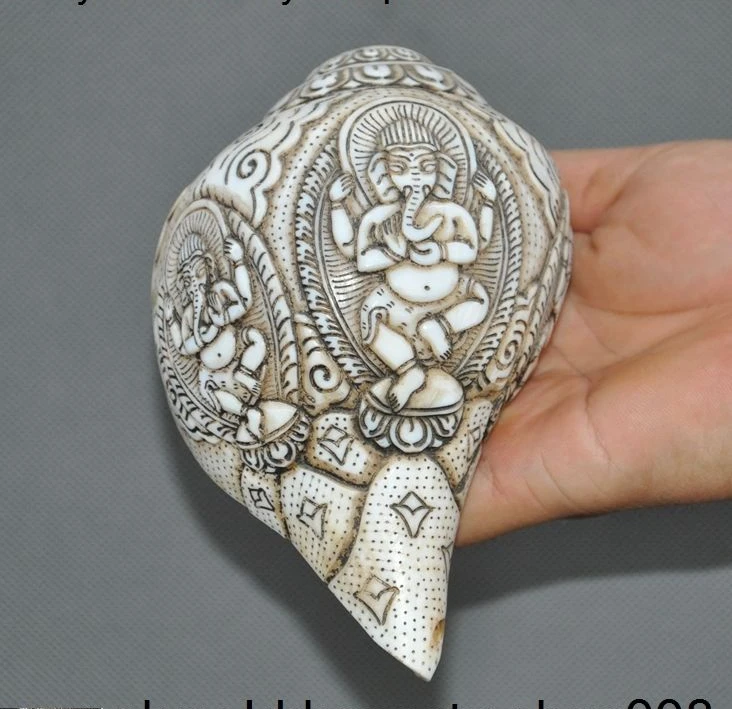 

old Tibet temple Conch Shell Trumpet wealth God Elephant Jambhala Buddha statue