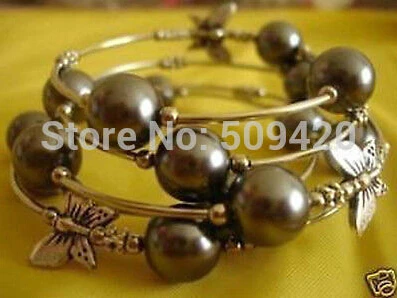 

hot sellWholesale!!10pcs Beautiful Tibet silver Chocolate shell pearl bracelet