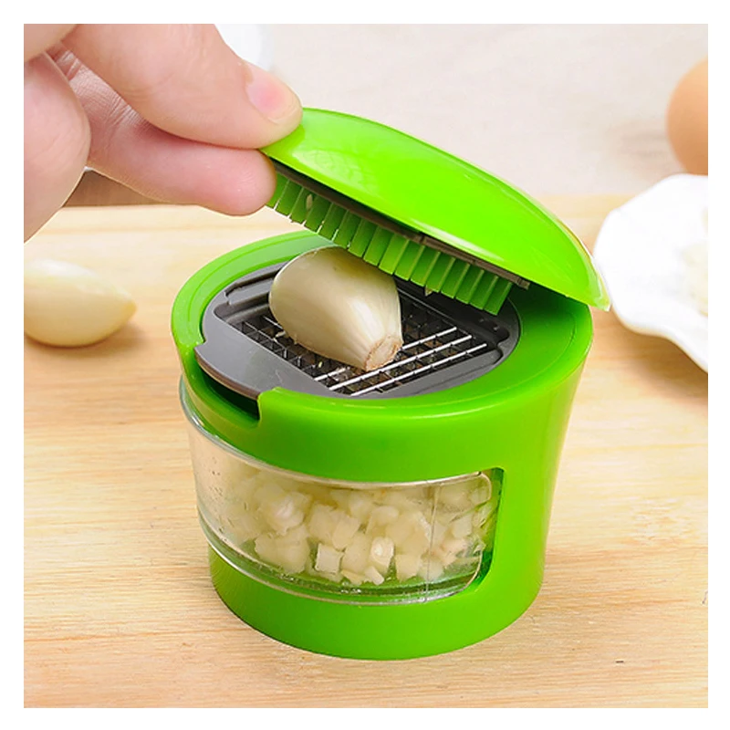 

1 pcs Cut the garlic cutter with a multi-function garlic cutter kitchen small tool garlic press