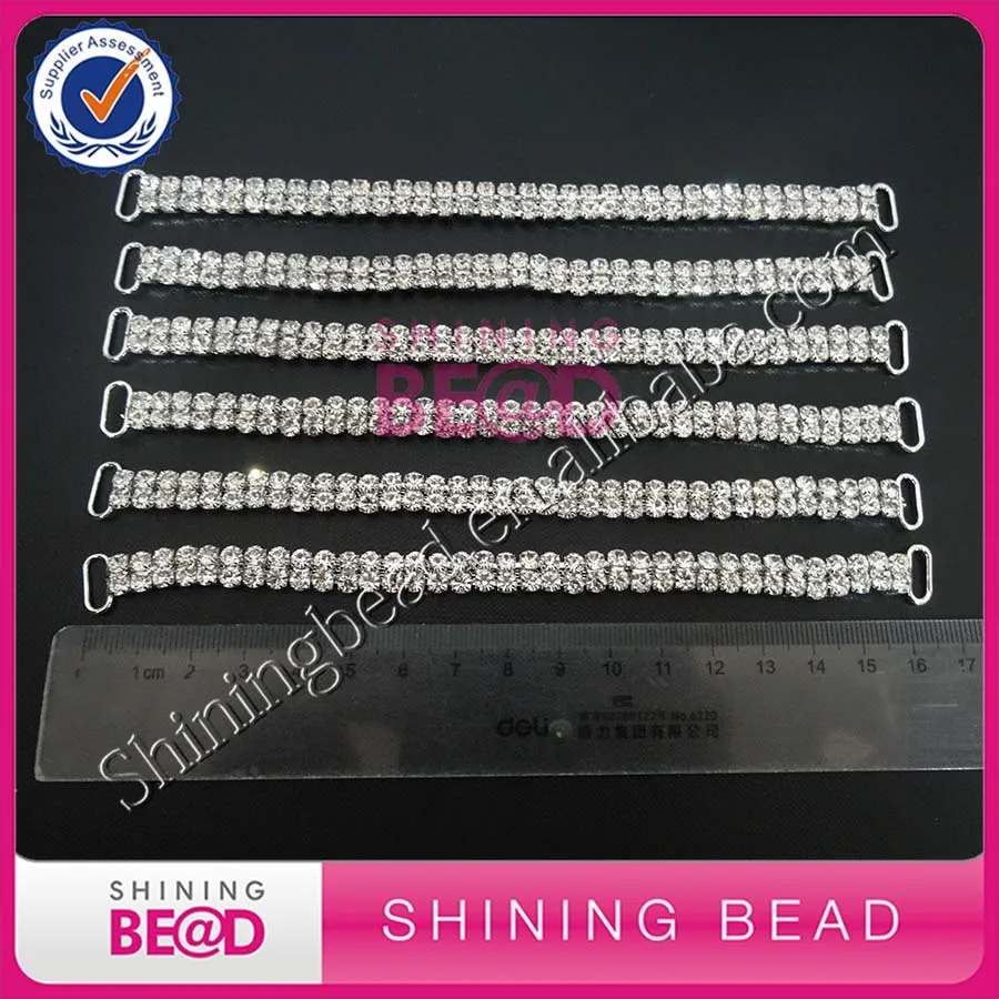 

Two rows AB rhinestone and clear rhinestone around 10 cm and around 17cm bikini connector,30 piece per style ,total 120piece