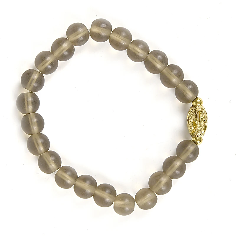 

Have 7*12 MM Golden high - grade pendant have natural Tea-colored Fresh and translucent elegant beads Bracelet.