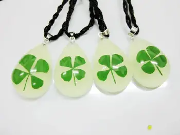 

FREE SHIPPING 12 pcs fashion real four leaf clover glow design cool pendant