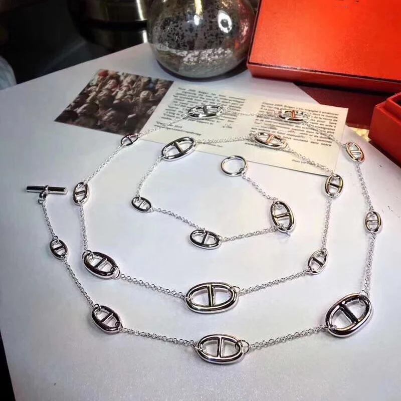 

Fashion jewelry. New S925 round letter in Sterling silver, luxurious long necklace, sweater chain. Trend. Banquet party.